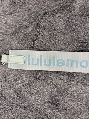 lululemon light blue never lost keychain